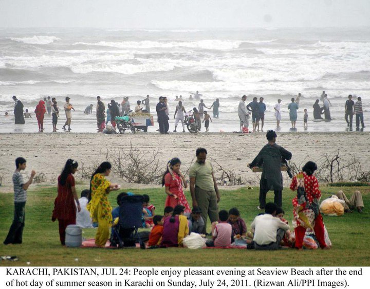 Name:  People enjoying on sea view beach.jpg
Views: 1854
Size:  103.9 KB