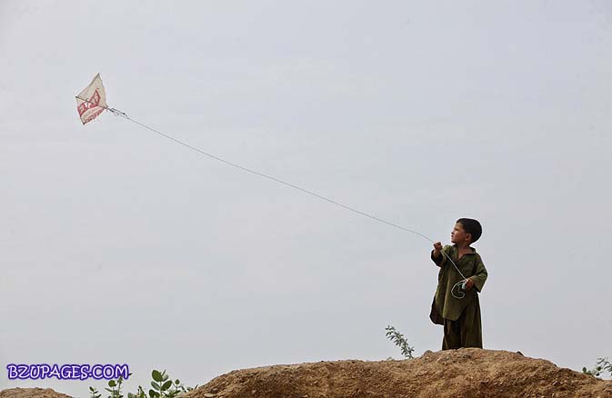 Name:  Five-year-old Samiullah, a boy of Afghan descent, flies a kite near his house in a refugee villa.jpg
Views: 795
Size:  28.0 KB
