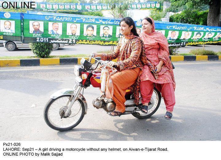 Name:  Girl driving Motorcycle without Helmet in Lahore.jpg
Views: 14098
Size:  93.7 KB