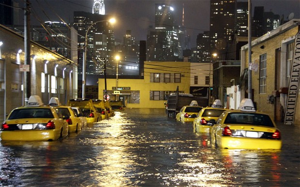 Name:  New York taxis are stranded on a flooded street in Queens.jpg
Views: 1168
Size:  94.1 KB