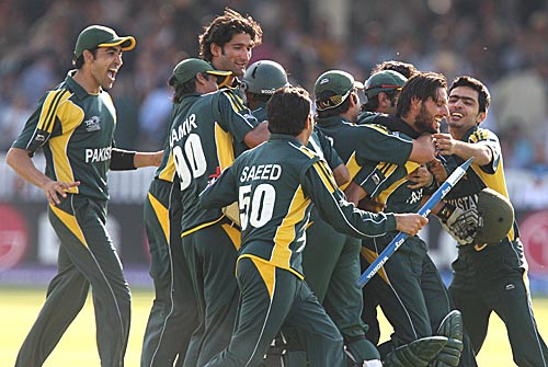 Name:  Shahid Afridi is mobbed by his team-mates after he guided Pakistan team.jpg
Views: 31416
Size:  47.6 KB