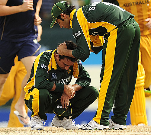 Name:  A disconsolate Saeed Ajmal is comforted by Salman Butt after Pakistan's shock defeat against Aus.jpg
Views: 1359
Size:  84.9 KB