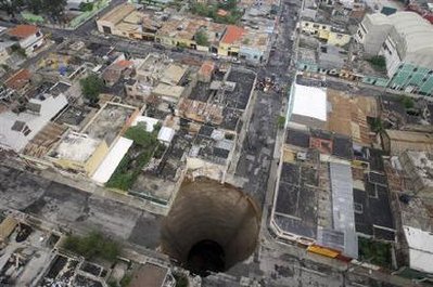 Name:  Flooding opens up sinkholes in Guatemala City.jpg
Views: 895
Size:  36.8 KB