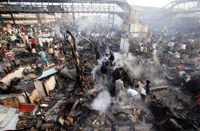 Name:  Residents search for their belongings amid the ruins of the Gharib Nagar slum in Mumbai .jpg
Views: 1795
Size:  23.6 KB