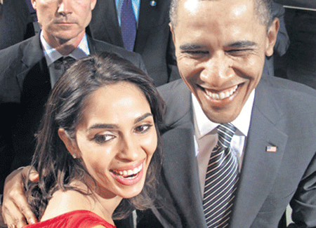 Name:  mallika-obama.gif
Views: 309
Size:  100.0 KB