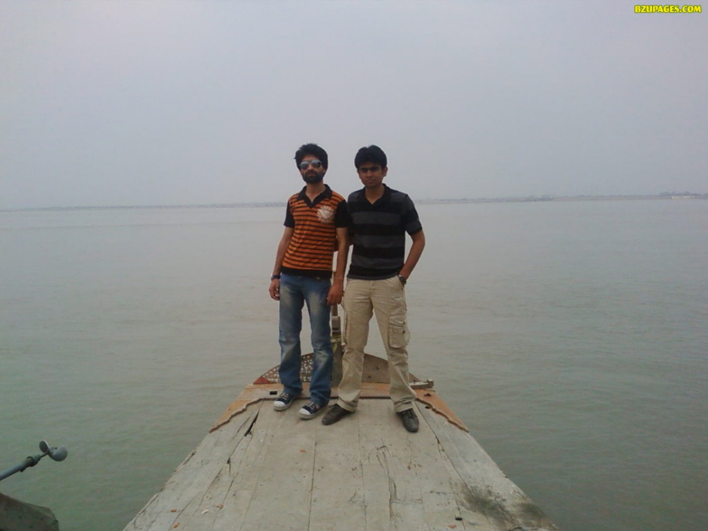 Bukhtyar and Ahmad near edge of boot