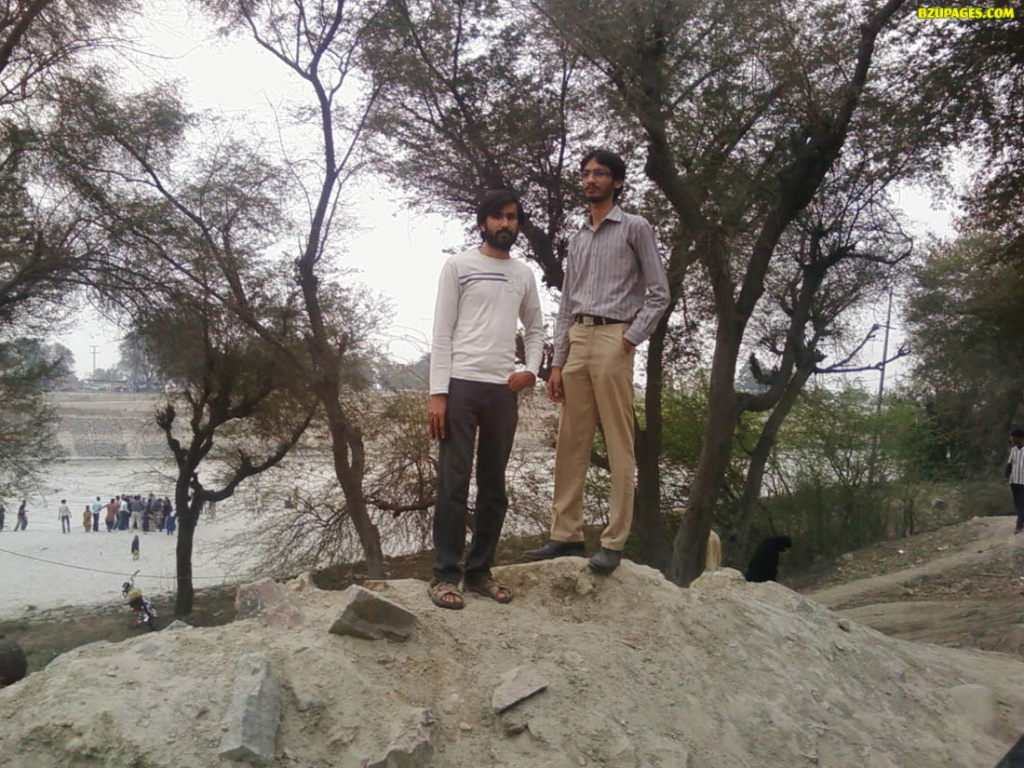 on a mound Aatif and Sheraz on a mound
