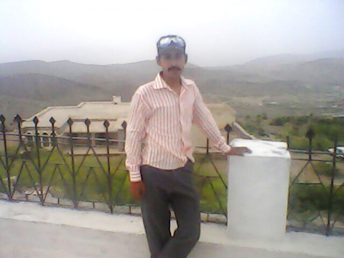 I am standing the boundary wall of mosque toward the valley