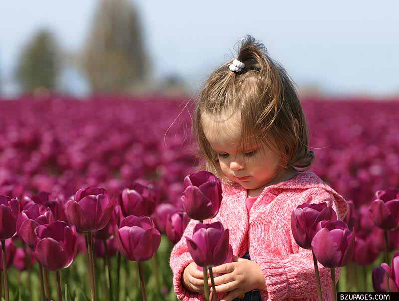 baby with rose flower