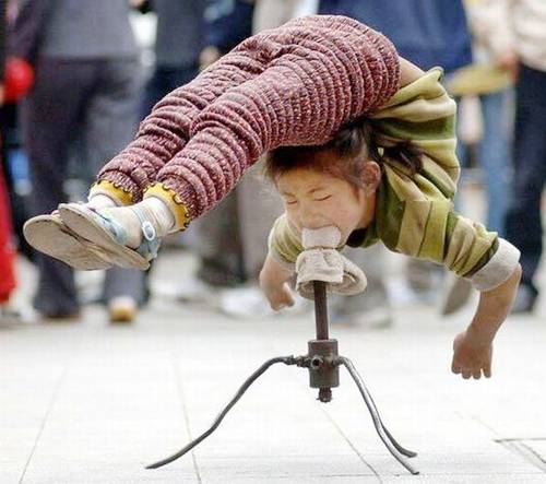 Girl Gymnastic  Trick by his mouth